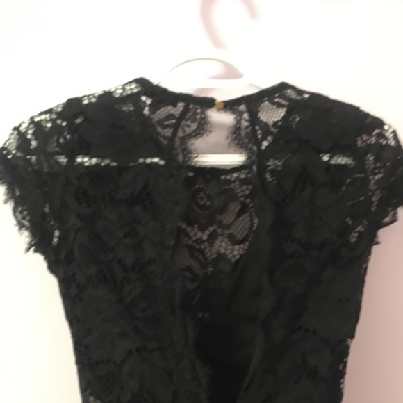 Lacy party bodysuit (top) with low v-cut front and open back - Picture 6 of 6